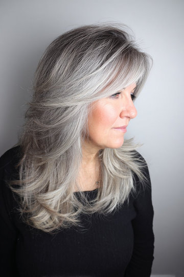 1 long-layered-ash-silver-blonde-feathered-bangs-side-swept_pp